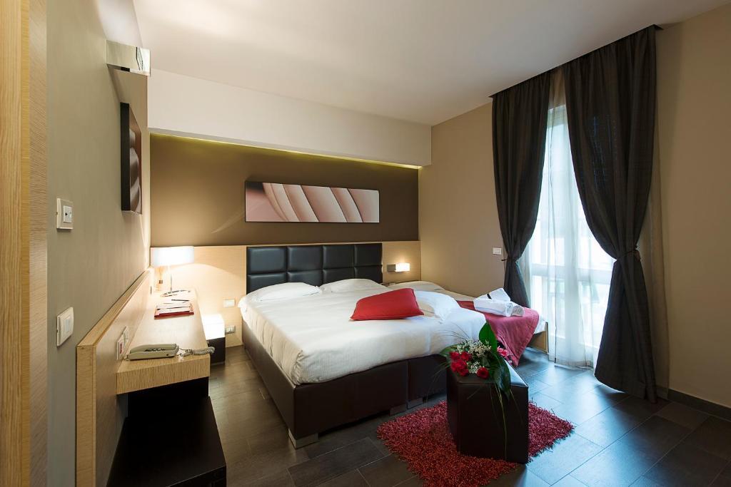 Unahotels Villa Dei Platani Foligno Quarto foto