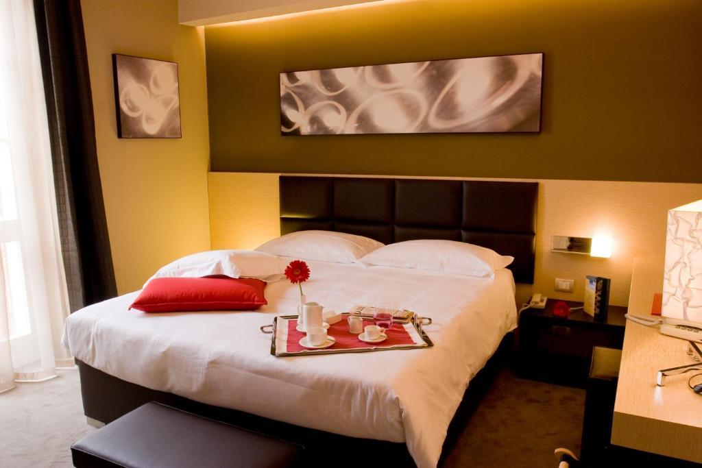 Unahotels Villa Dei Platani Foligno Quarto foto